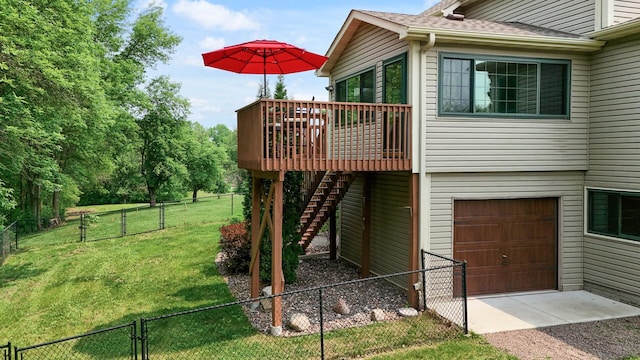 22774 Olivine St NW, Nowthen, MN 55330 - view of side of property with an attached garage, a wooden deck, a gate, a shingled roof, and stairway