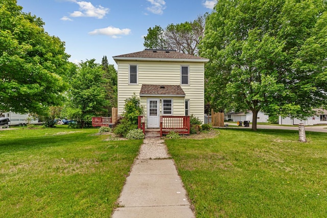300 Ellington St, West Concord, MN 55985 - traditional home with a deck and a front lawn
