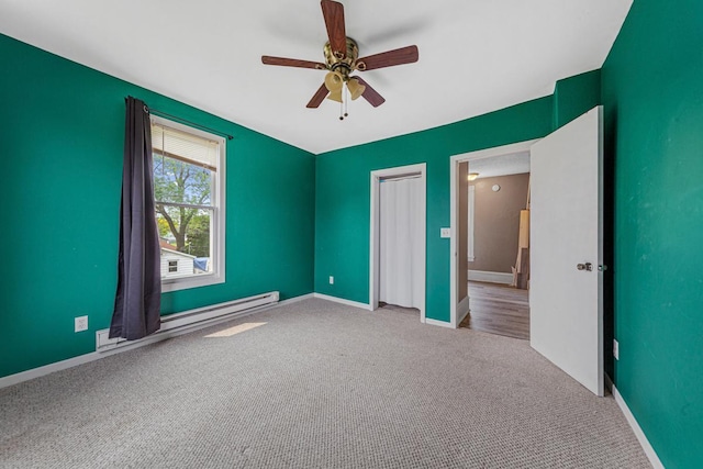 300 Ellington St, West Concord, MN 55985 - unfurnished bedroom featuring carpet, baseboards, a closet, and ceiling fan