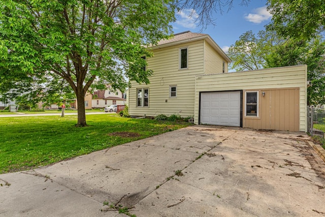 300 Ellington St, West Concord, MN 55985 - view of home's exterior featuring concrete driveway and an attached garage