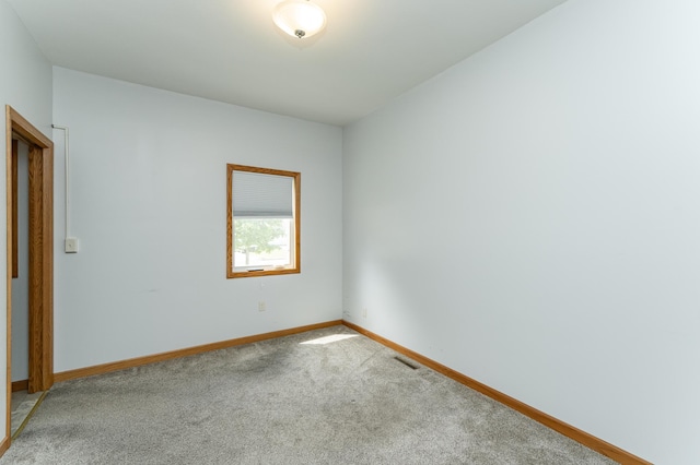 520 State St, West Concord, MN 55985 - empty room featuring carpet flooring and baseboards