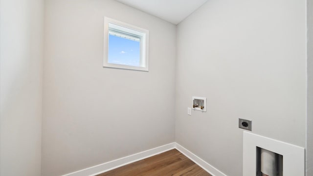 7472 170th Ave NW, Ramsey, MN 55303 - washroom with hookup for an electric dryer, hookup for a washing machine, baseboards, and dark wood-type flooring