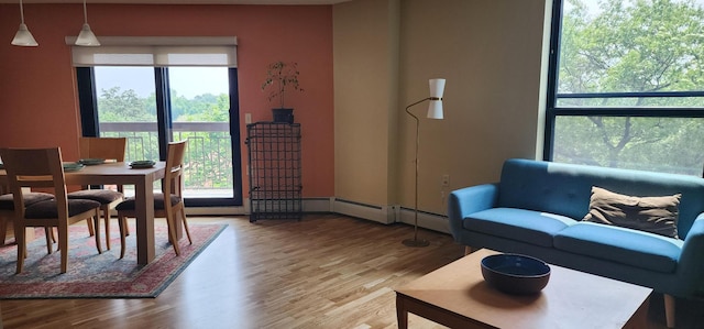 6615 Lake Shore Dr S Unit 717, Richfield, MN 55423 - living room with light wood-type flooring and plenty of natural light