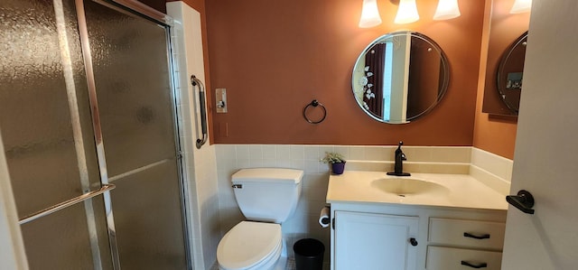 6615 Lake Shore Dr S Unit 717, Richfield, MN 55423 - full bath with vanity, wainscoting, a shower stall, and tile walls
