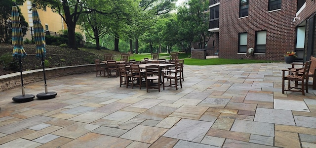 6615 Lake Shore Dr S Unit 717, Richfield, MN 55423 - view of patio / terrace featuring outdoor dining space