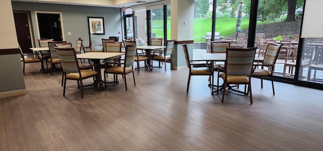 6615 Lake Shore Dr S Unit 717, Richfield, MN 55423 - dining space featuring wood finished floors