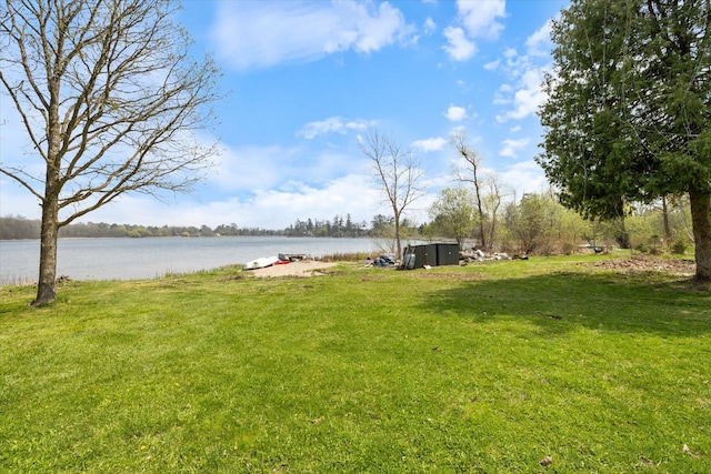604 16th Ave, Grand Rapids, MN 55744 - view of green lawn featuring a water view