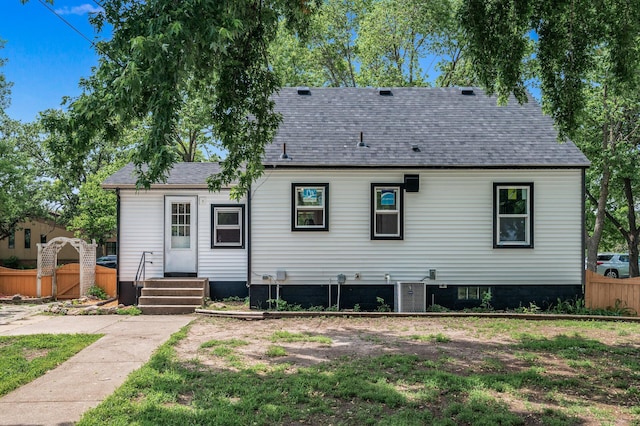 404 8th Ave S, Princeton, MN 55371 - rear view of house featuring a shingled roof