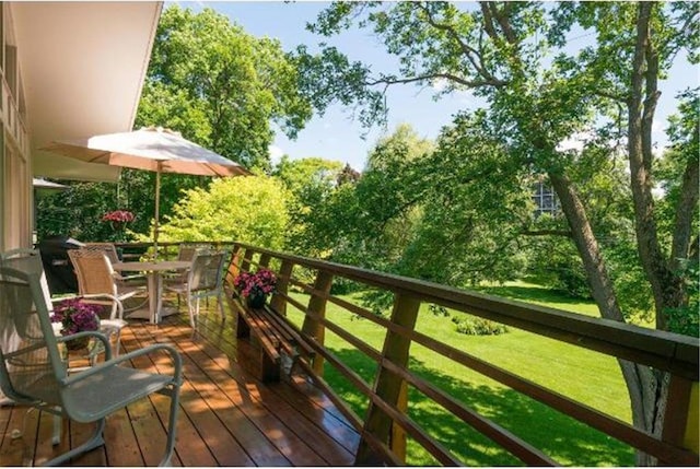 5157 Abercrombie Dr, Edina, MN 55439 - view of wooden balcony featuring outdoor dining area and a wooden deck