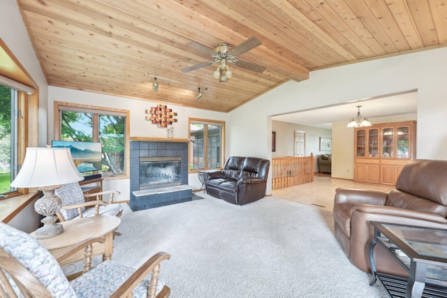 1852 13th Ave W, Shakopee, MN 55379 - living area with a fireplace, carpet, wooden ceiling, a chandelier, and a ceiling fan