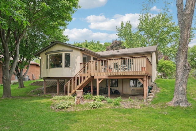 1852 13th Ave W, Shakopee, MN 55379 - rear view of house featuring stairway, a wooden deck, a lawn, and stucco siding