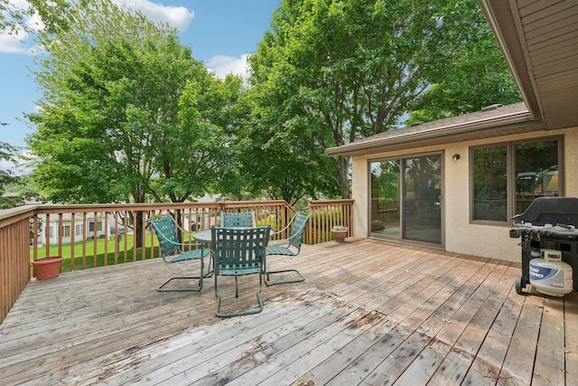 1852 13th Ave W, Shakopee, MN 55379 - wooden deck with grilling area and outdoor dining area