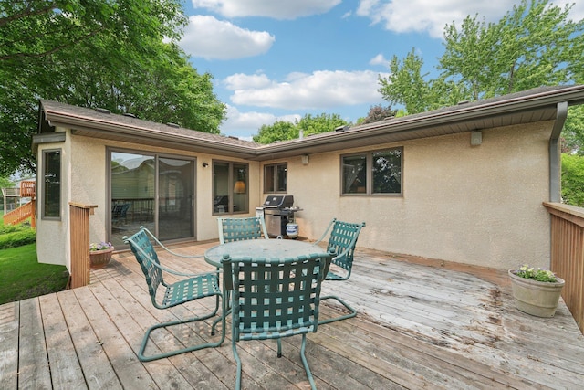 1852 13th Ave W, Shakopee, MN 55379 - wooden terrace with grilling area and outdoor dining area