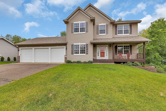 25845 12th St W, Zimmerman, MN 55398 - traditional-style house with asphalt driveway, a garage, covered porch, a front lawn, and roof with shingles