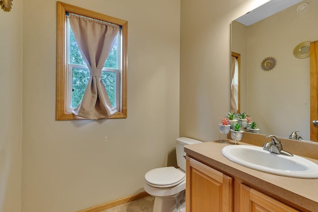 25845 12th St W, Zimmerman, MN 55398 - bathroom with toilet, vanity, and tile patterned flooring