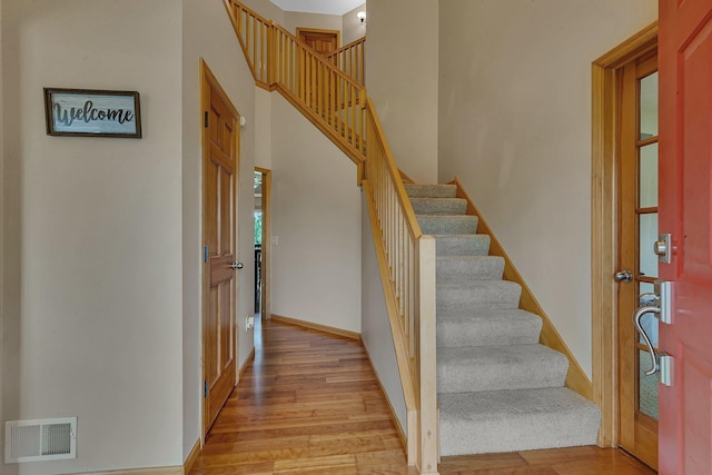 25845 12th St W, Zimmerman, MN 55398 - stairway with wood finished floors and baseboards