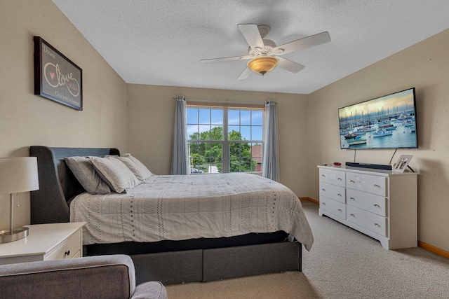 25845 12th St W, Zimmerman, MN 55398 - bedroom with light colored carpet, a textured ceiling, ceiling fan, and baseboards
