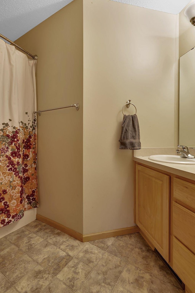 25845 12th St W, Zimmerman, MN 55398 - full bath with vanity, curtained shower, and baseboards