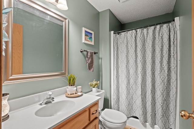 5641 146th Ave NW, Ramsey, MN 55303 - full bathroom with vanity, a textured ceiling, toilet, and shower / bath combo with shower curtain