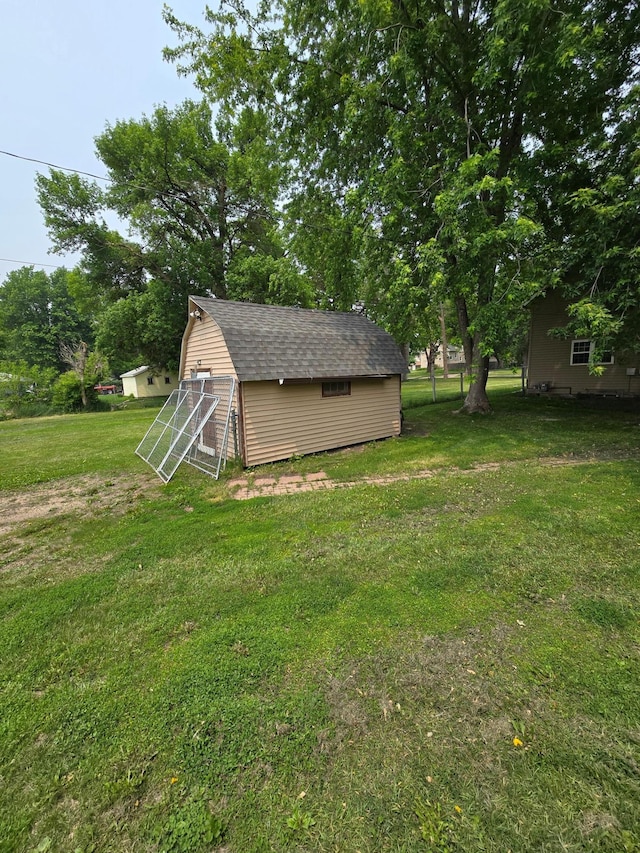 25 Morgan St, Tracy, MN 56175 - view of green lawn featuring an outdoor structure