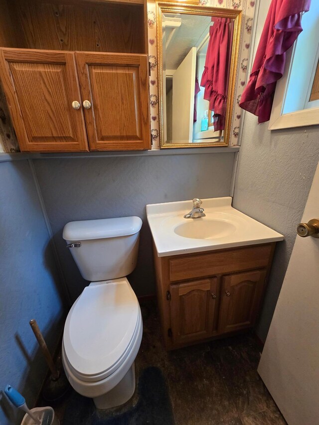 25 Morgan St, Tracy, MN 56175 - bathroom featuring vanity and toilet