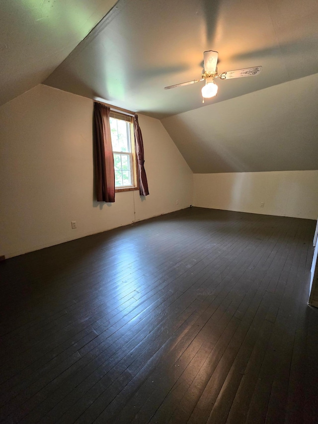 25 Morgan St, Tracy, MN 56175 - additional living space with dark wood-style floors, lofted ceiling, and ceiling fan