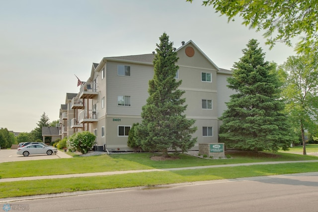 3401 28th St SW # 108, Fargo, ND 58104 - view of building exterior with central AC unit