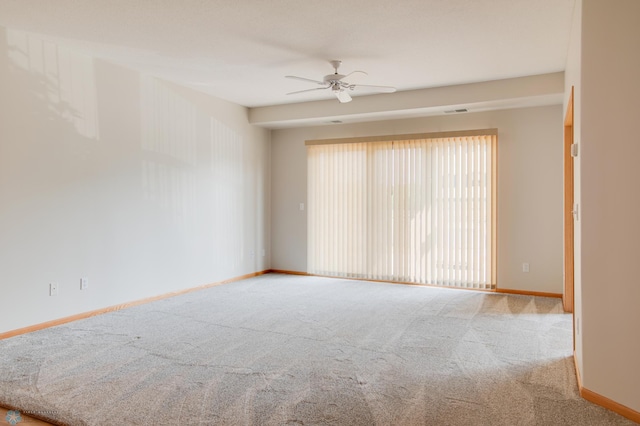 3401 28th St SW # 108, Fargo, ND 58104 - carpeted empty room featuring ceiling fan and baseboards