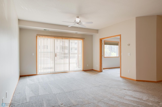 3401 28th St SW # 108, Fargo, ND 58104 - carpeted empty room with ceiling fan and baseboards