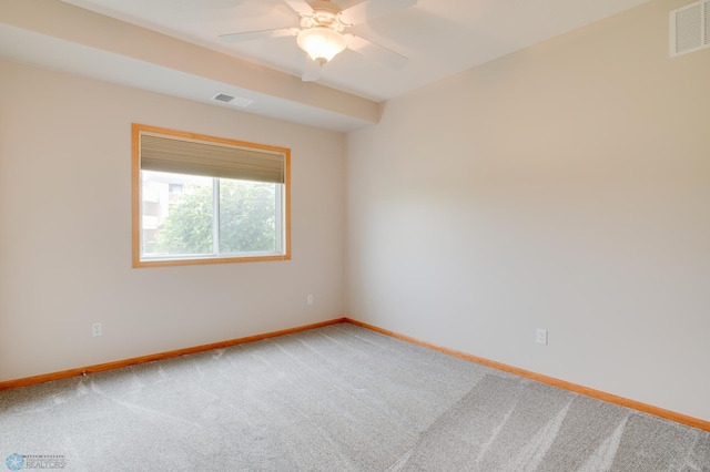 3401 28th St SW # 108, Fargo, ND 58104 - carpeted spare room with baseboards and a ceiling fan