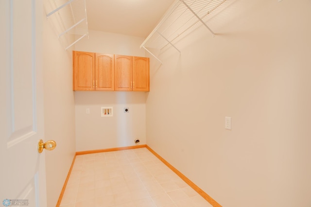 3401 28th St SW # 108, Fargo, ND 58104 - laundry room with electric dryer hookup, hookup for a washing machine, cabinet space, and baseboards