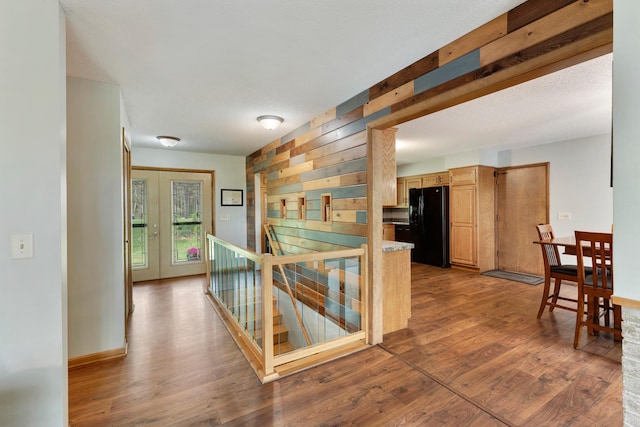 13100 Island View Dr NW, Elk River, MN 55330 - hall featuring an upstairs landing, wood finished floors, and french doors