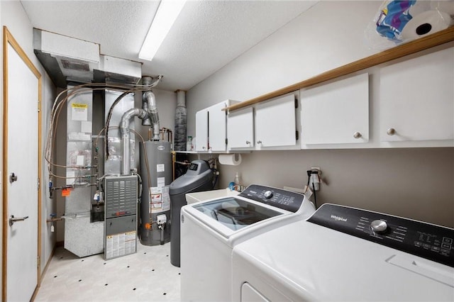 11509 Quay St, Coon Rapids, MN 55433 - laundry room with washer and clothes dryer, cabinet space, water heater, light floors, and a textured ceiling