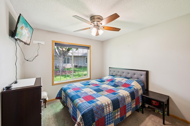 11509 Quay St, Coon Rapids, MN 55433 - carpeted bedroom with baseboards, ceiling fan, and a textured ceiling
