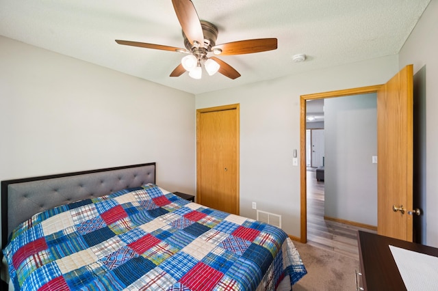 11509 Quay St, Coon Rapids, MN 55433 - bedroom featuring ceiling fan, light colored carpet, and a closet