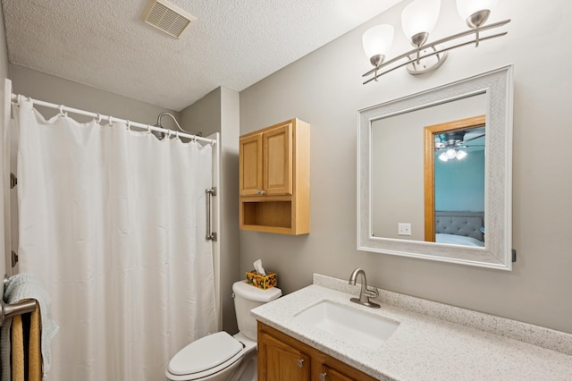 11509 Quay St, Coon Rapids, MN 55433 - bathroom featuring toilet, vanity, a textured ceiling, and a shower with shower curtain