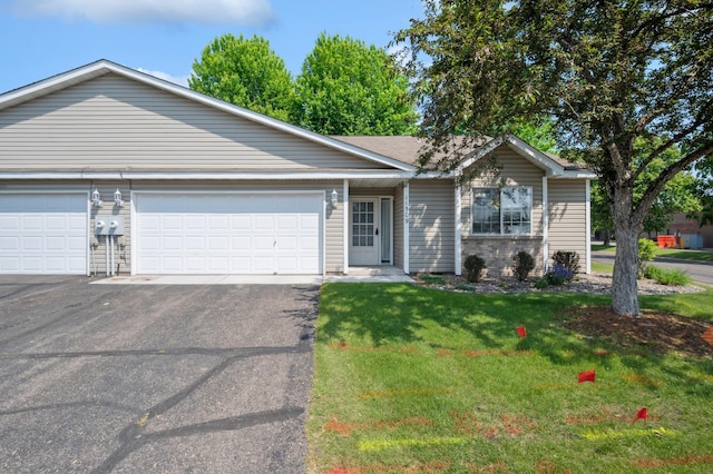 11509 Quay St, Coon Rapids, MN 55433 - ranch-style house featuring asphalt driveway, a garage, and a front yard