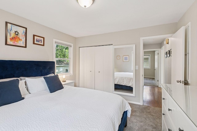 4124 14th Ave S, Minneapolis, MN 55407 - bedroom with a closet, carpet flooring, and baseboards
