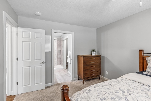 320 Ford Rd Unit 3, Saint Louis Park, MN 55426 - bedroom with carpet and a textured ceiling
