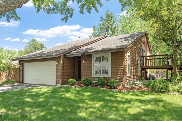 5554 Knoll Dr, Shoreview, MN 55126 - view of front of home with an attached garage, roof with shingles, a front yard, and driveway