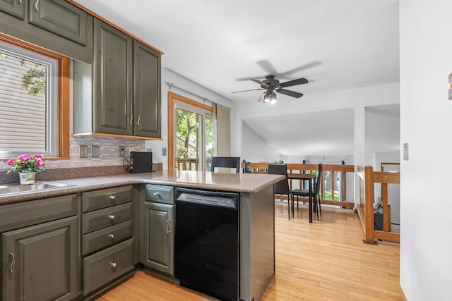 5554 Knoll Dr, Shoreview, MN 55126 - kitchen featuring black dishwasher, ceiling fan, a peninsula, and light wood finished floors