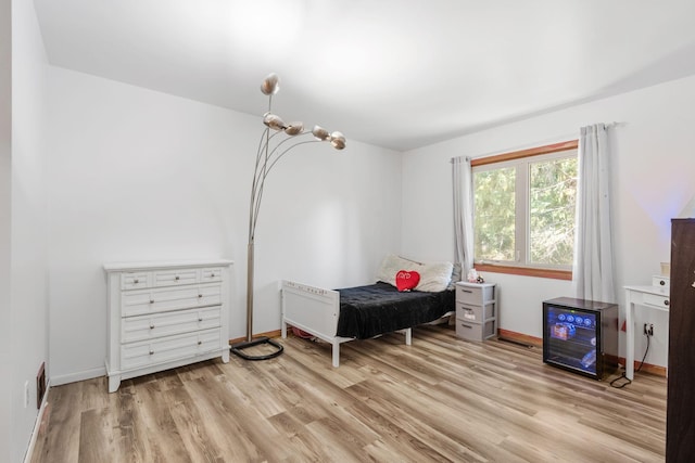 5554 Knoll Dr, Shoreview, MN 55126 - bedroom with light wood-type flooring and baseboards