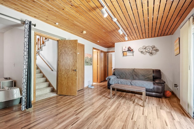 5554 Knoll Dr, Shoreview, MN 55126 - living area with rail lighting, stairs, light wood-style floors, and wooden ceiling