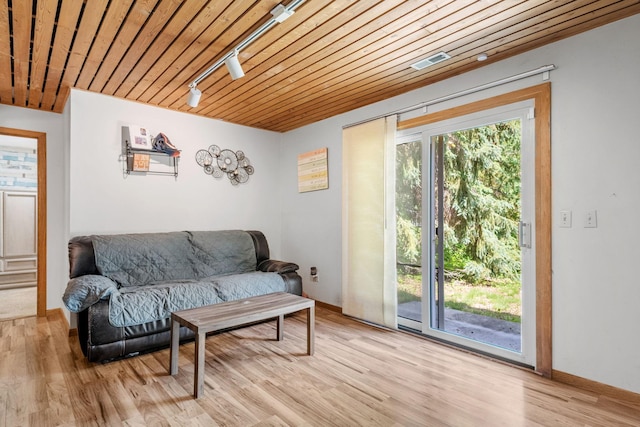 5554 Knoll Dr, Shoreview, MN 55126 - living area featuring wood ceiling, wood finished floors, and track lighting