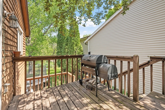 5554 Knoll Dr, Shoreview, MN 55126 - wooden terrace with area for grilling