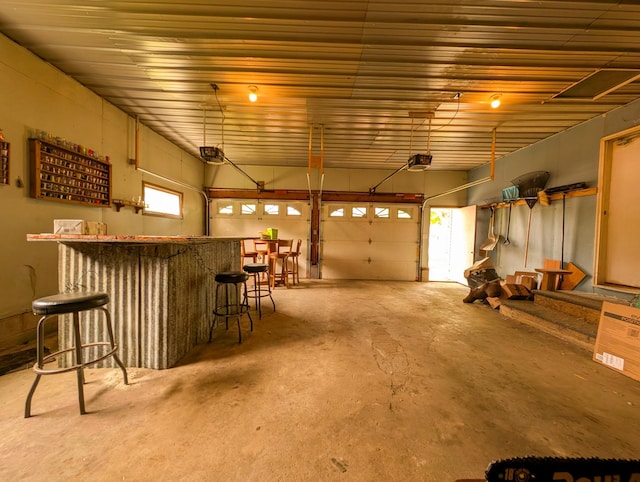 1422 6th St SE, Wadena, MN 56482 - garage featuring a garage door opener