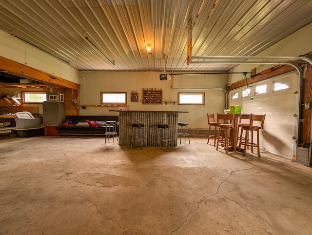 1422 6th St SE, Wadena, MN 56482 - garage featuring a garage door opener