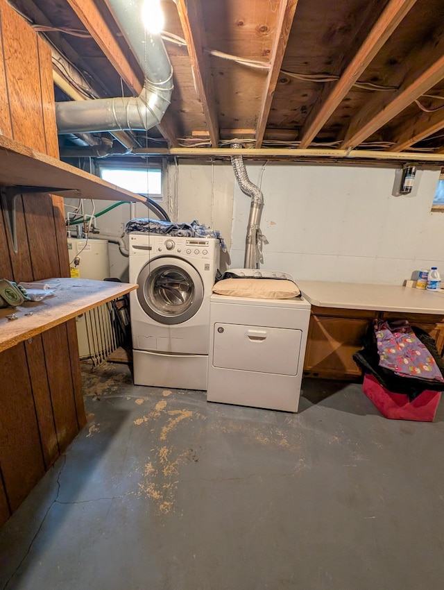 1422 6th St SE, Wadena, MN 56482 - basement with separate washer and dryer, water heater, and a workshop area