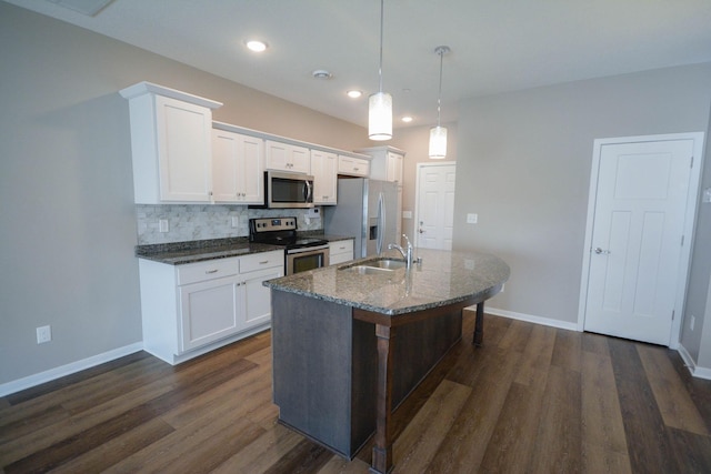 5656 Harvest Moon Blvd NW, Rochester, MN 55901 - kitchen featuring appliances with stainless steel finishes, a sink, a kitchen island with sink, dark wood-style floors, and recessed lighting