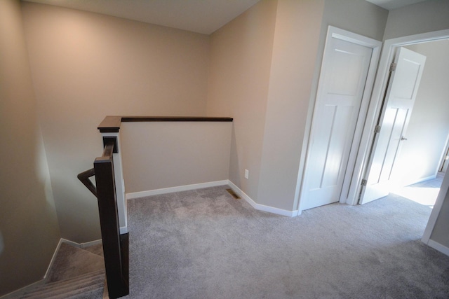 5656 Harvest Moon Blvd NW, Rochester, MN 55901 - hall with carpet floors, an upstairs landing, and baseboards
